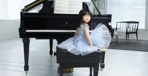 Childs_Hands_on_Piano_keyboard_Light_Co_Print_Shoot_Joy_Pride